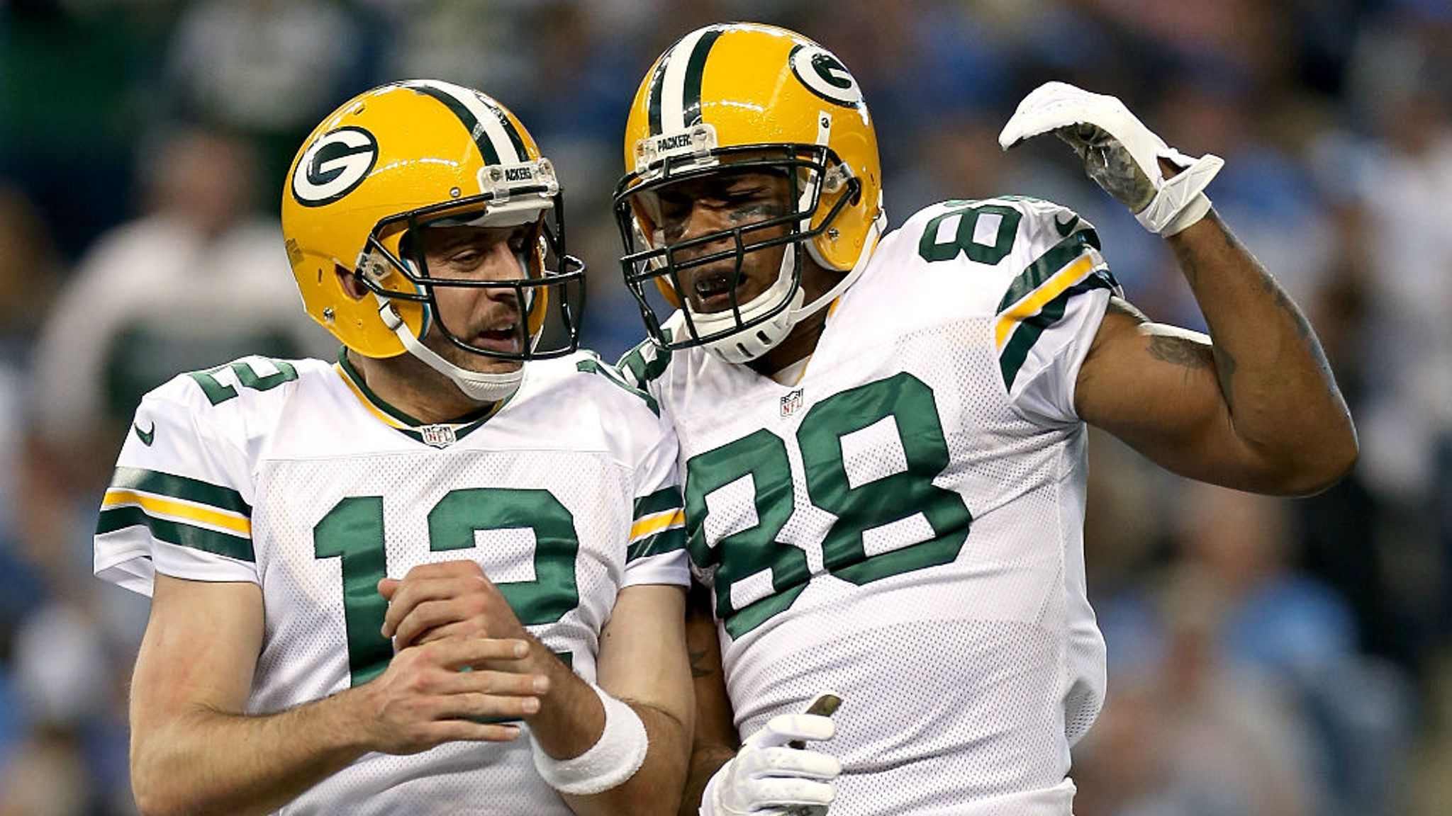 Green Bay Packers Jermichael Finley celebrates with Aaron Rodgers