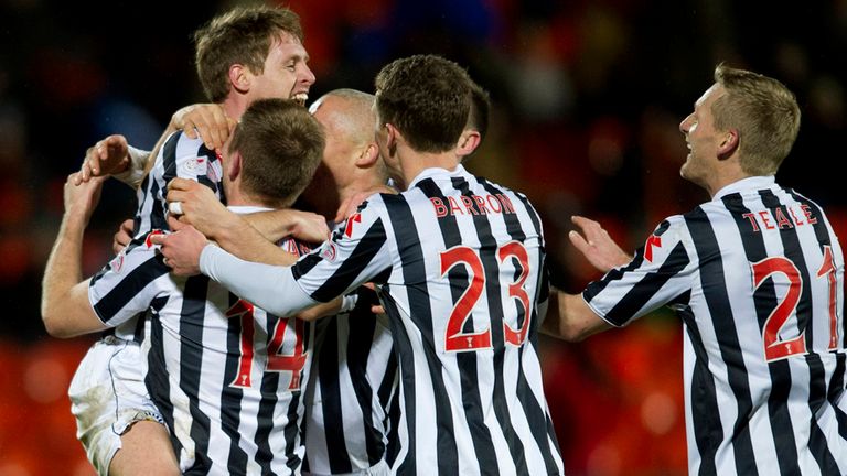 David van Zanten: Mobbed after rare goal sealed victory over Dundee United.