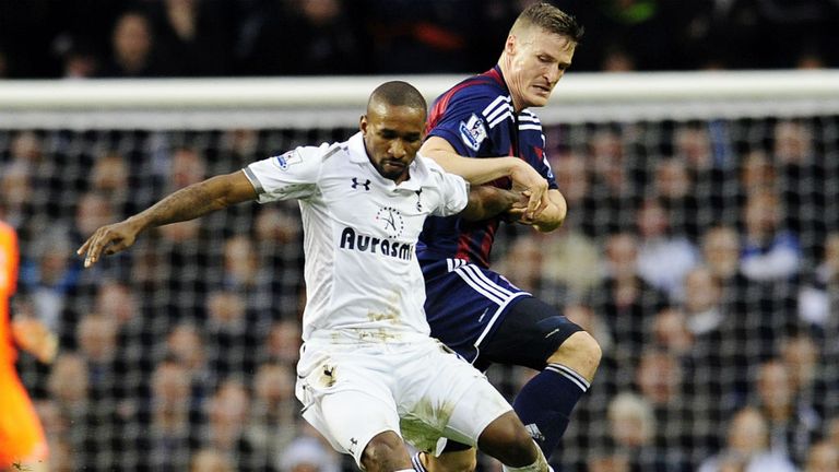 Jermain Defoe battles with Robert Huth in a tight first half