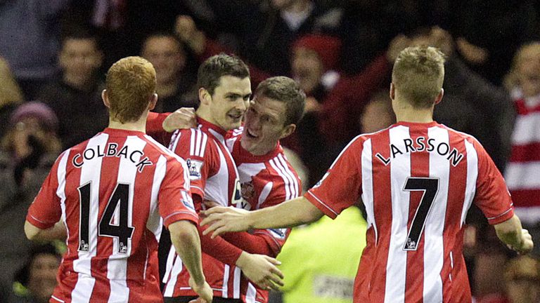 Adam Johnson: Celebrates winner against former club