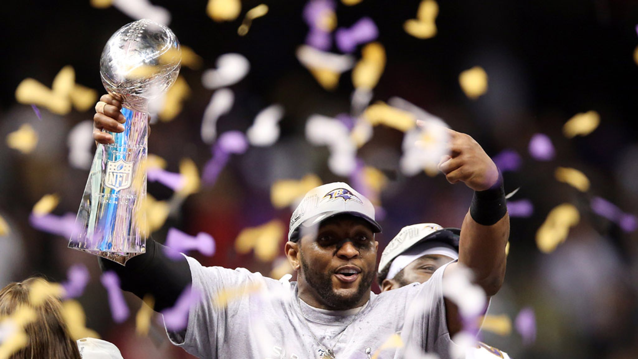 Baltimore Ravens linebacker Ray Lewis holds the Lombardi trophy