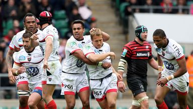 Jonny Wilkinson is mobbed by team-mates after scoring a crucial drop-goal