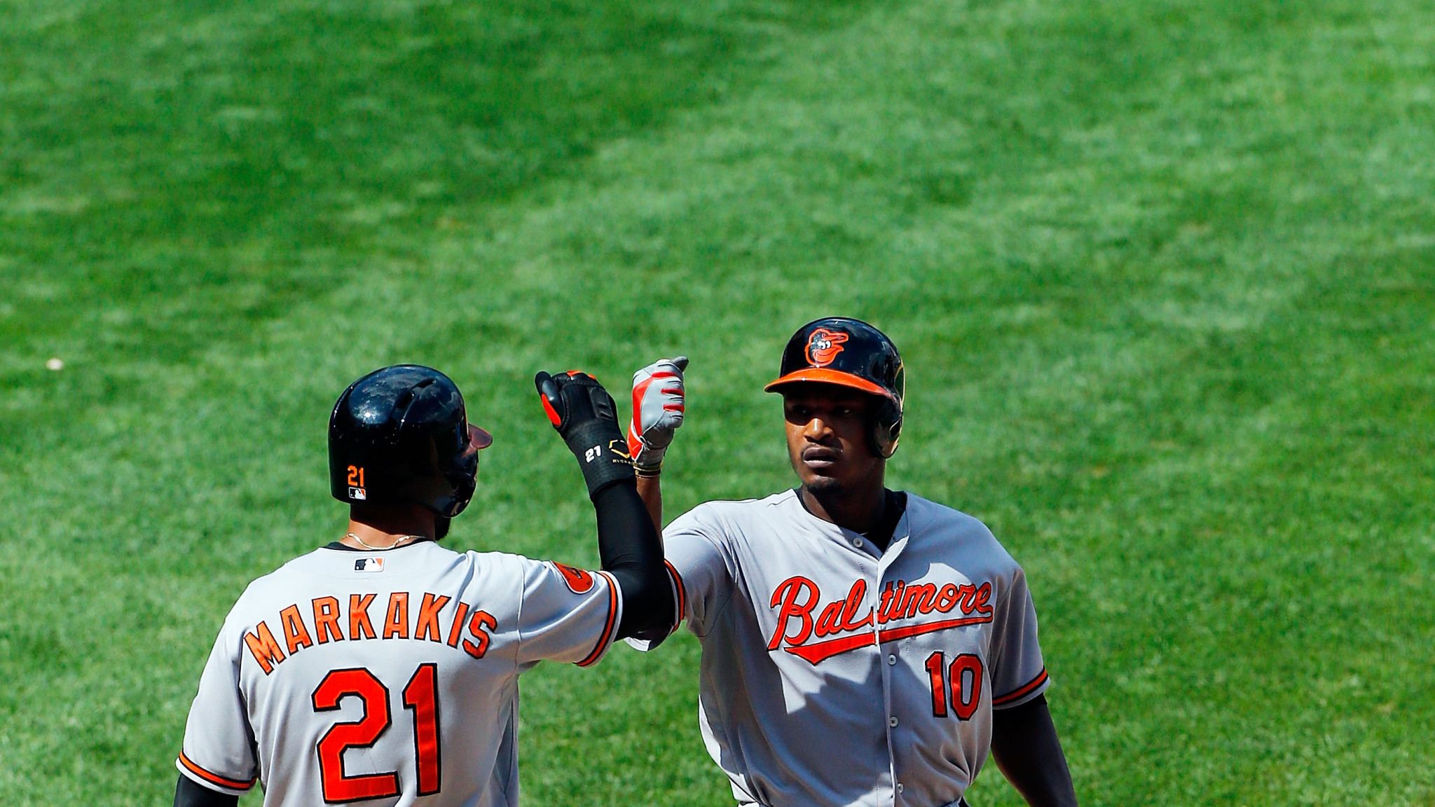 Reds beat Orioles 11-7 in 10 innings to win series