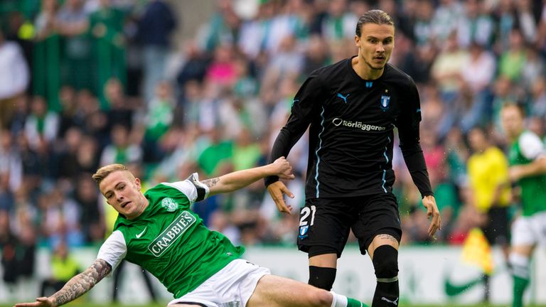 Hibs' Danny Handling battles with Malmo's Erik Jansson.