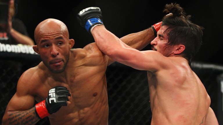 Demetrious Johnson (left) hasn't lost since originating the flyweight division