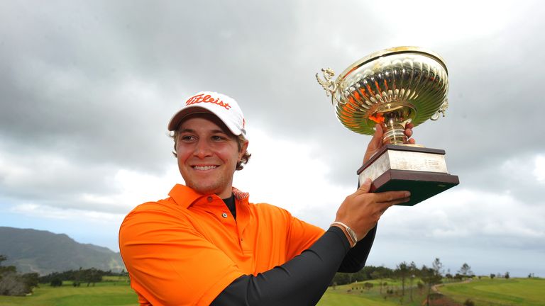 Peter Uihlein poses with the trophy after winning the Madeira Islands Open
