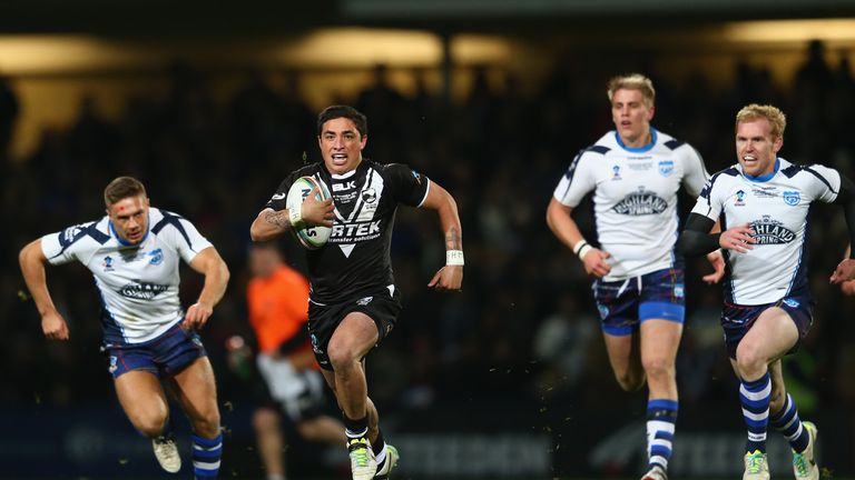 Kevin Locke breaks clear of the Scotland defence