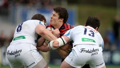 Big impact: Joel Tomkins is tackled by Dave Ewers and Ian Whitten