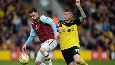 Image of Luke O'Neill (left) in action for former club Burnley