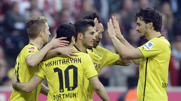 Henrikh Mkhitaryan: Celebrates Dortmund's opener at Bayern Munich