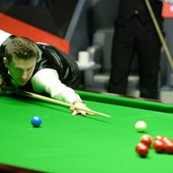 Mark Selby: world champion safely through