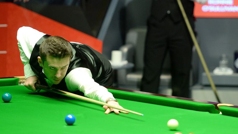 Mark Selby: world champion safely through