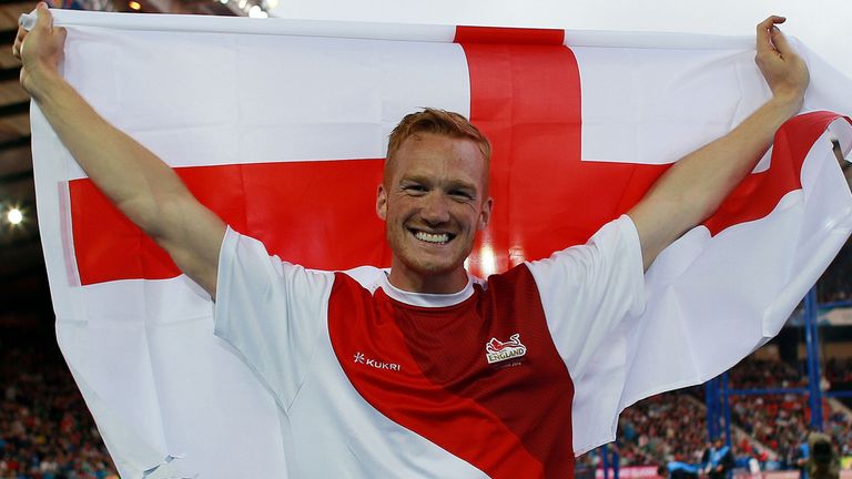 England's Greg Rutherford celebrates winning gold in the Men's Long Jump Final at Hampden Park