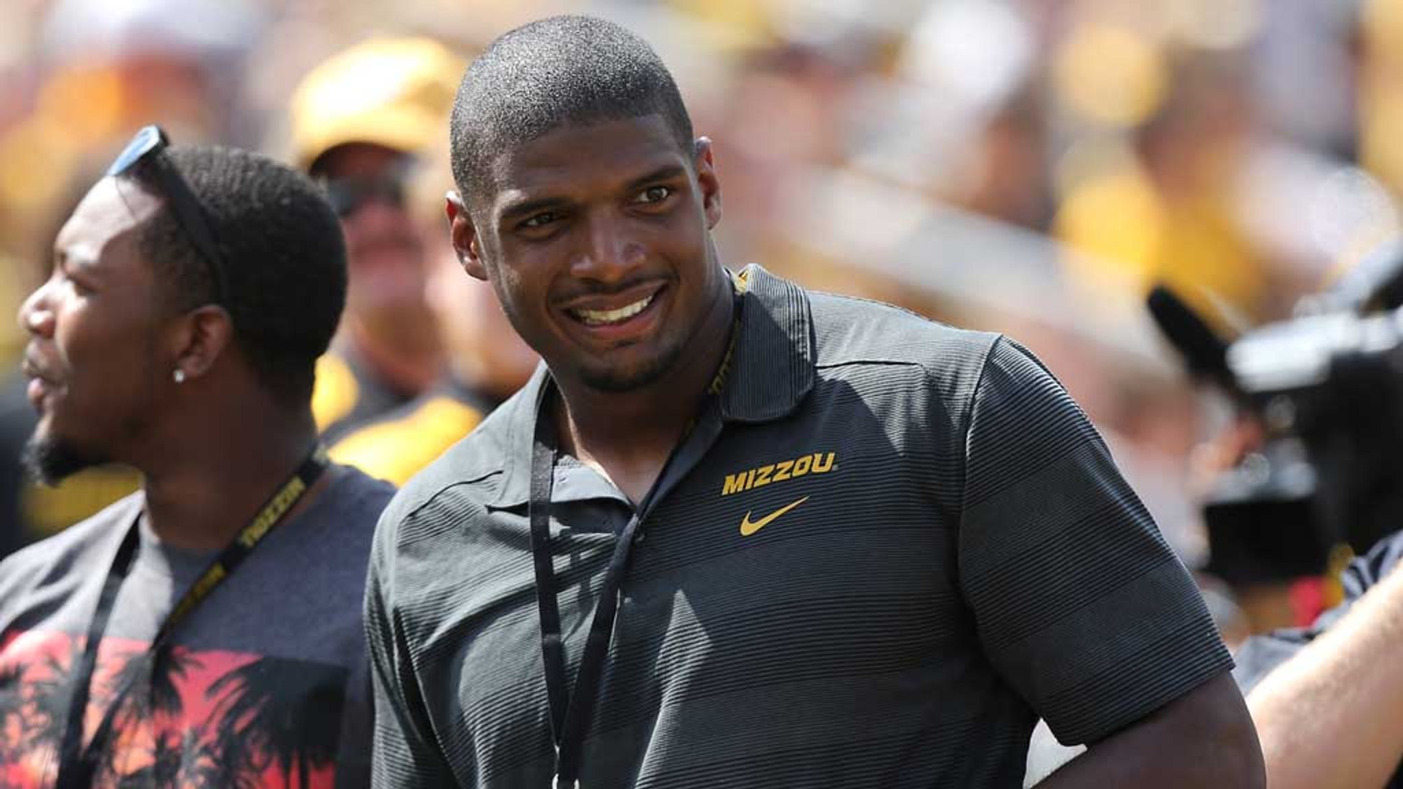 Michael Sam, first drafted openly gay player, cut by St. Louis