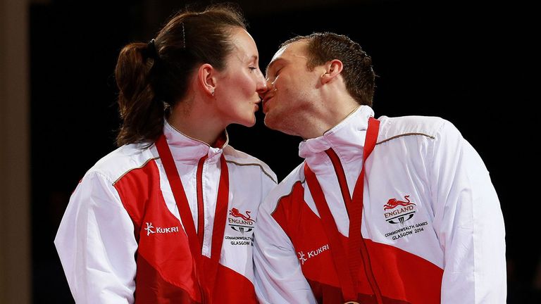 Golden kiss: Marital bliss for Joanna and Paul Drinkhall who celebrate winning the Commonwealth title