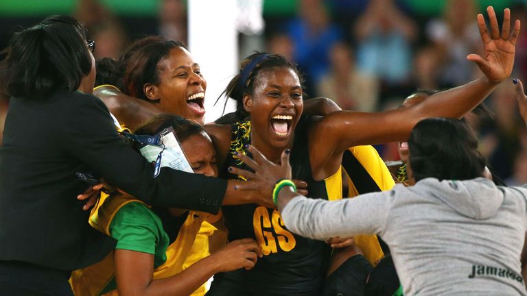 Romelda Aiken and her Jamaican team-mates celebrate victory against England in the bronze medal match