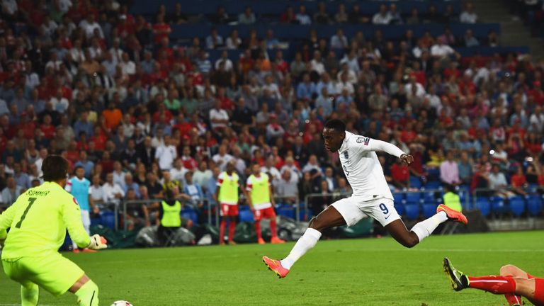Bargain-buy: Danny Welbeck fires home England's opening goal of the night in Switzerland