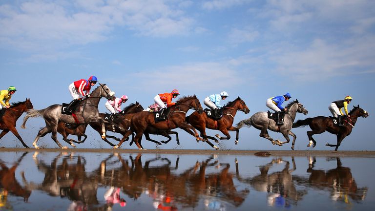 Runners and riders in action during the Barry Matthews Appreciation Society Handicap during Laytown races