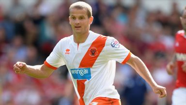 Image of Tomasz Cywka: Headed to Spotland Stadium