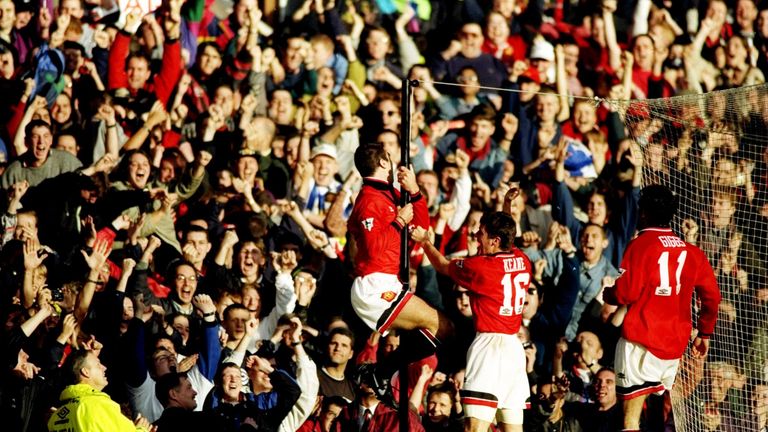 Eric Cantona of Manchester United celebrates scoring against Liverpool in 1995