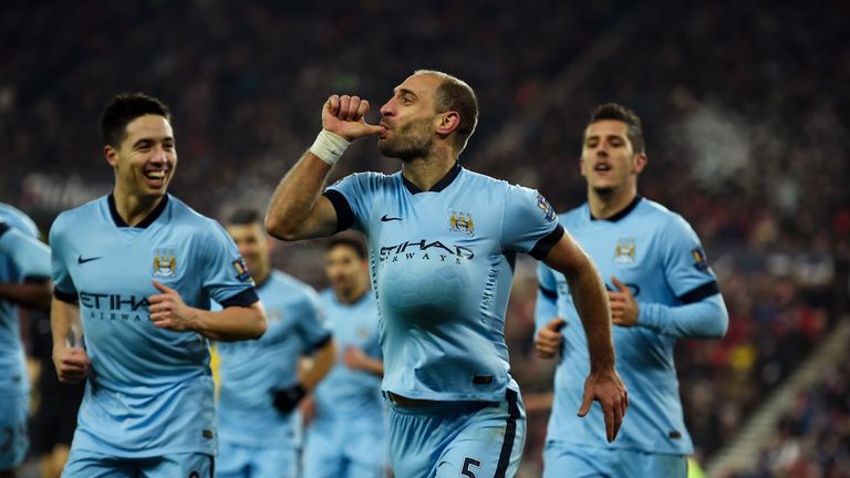 Zabaleta: celebrates City's third, as City maintain the pressure on Chelsea