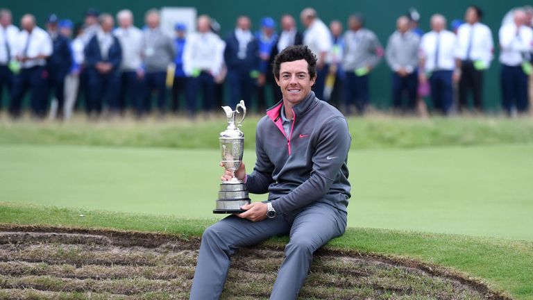 Rory McIlroy celebrates winning his first Open title last year