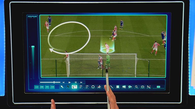 Peter Crouch is drawn to Cesc Fabregas' corner, and moves into the circle to leave space behind him