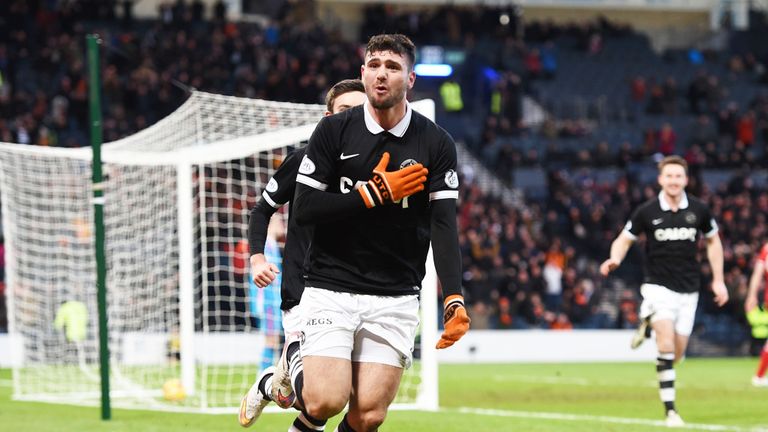 Nadir Ciftci: Celebrates after scoring the winner at Hampden Park