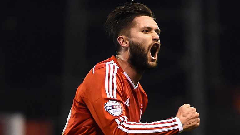 Henri Lansbury: Celebrates his winning goal against Bournemouth