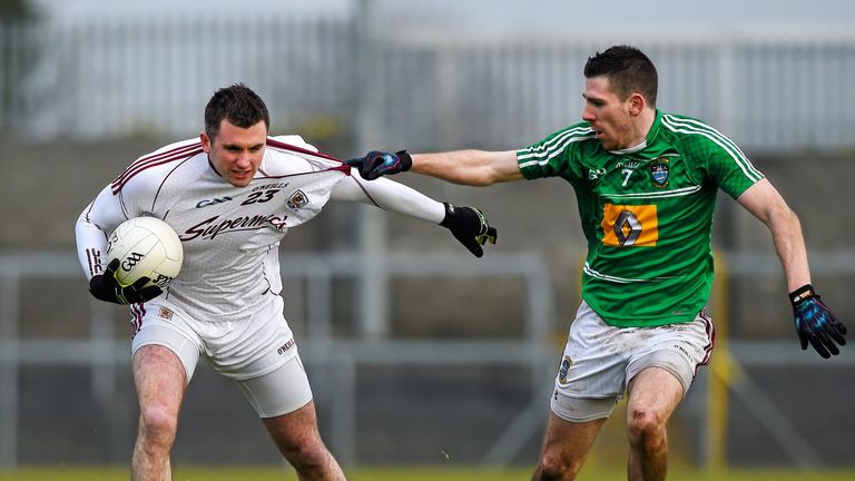 Galway forward Michael Martin is tackled by James Dolan