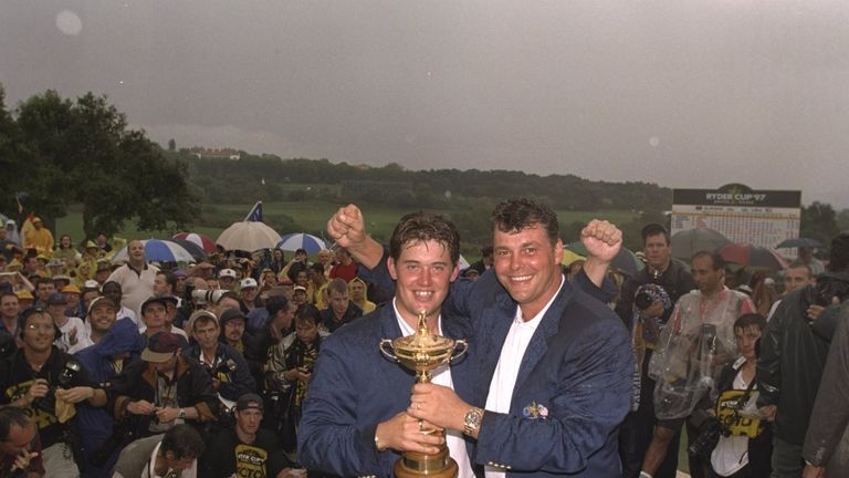 Clarke celebrates with Lee Westwood after victory at Valderrama.