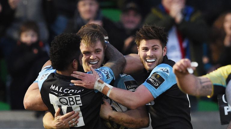 Pat MacArthur, centre, is congratulated after scoring Glasgow's only try against the Ospreys