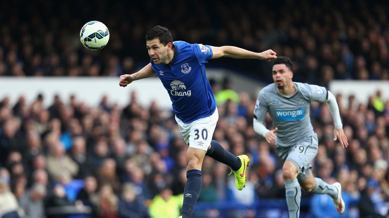 Antolin Alcaraz of Everton heads the ball