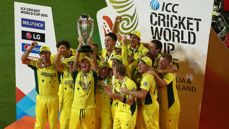 Australia hold the World Cup trophy aloft after beating New Zealand by seven wickets at the MCG in 2015