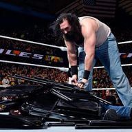 Luke Harper buried Dean Ambrose under steel chairs at Exteme Rules - to no avail