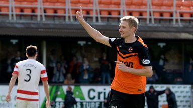 Image of Chris Erskine celebrates after putting Dundee United ahead against Hamilton.