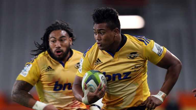 Julian Savea with ball in hand and supported by Ma'Nonu