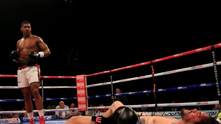 Anthony Joshua (left) in action against Rafael Zumbano Love