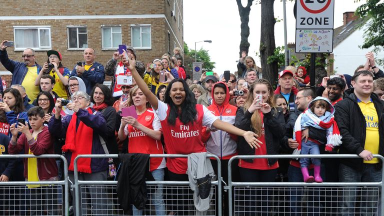 Fans of all ages lined to route to cheer their heroes.