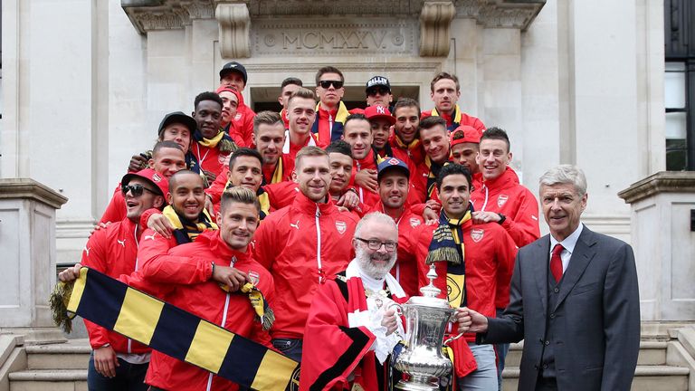 Arsene Wenger and his Arsenal team took the FA Cup to Islington Town Hall.