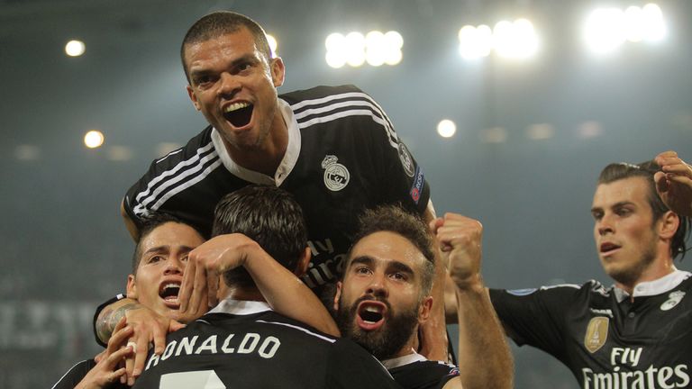Real Madrid celebrate the equaliser, scored by Cristiano Ronaldo