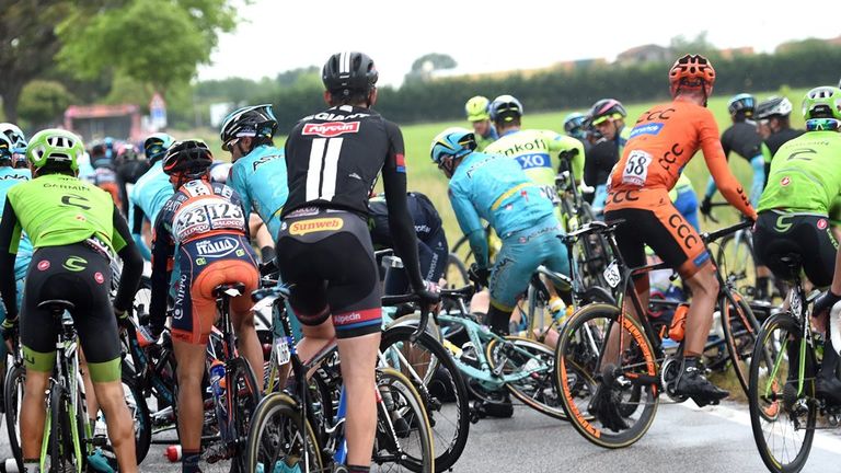 The late crash on stage 13, with Alberto Contador just visible in the background to the left of the rider in orange