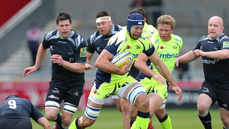 Josh Beaumont of Sale Sharks bursts through the Newcastle Falcons defence 