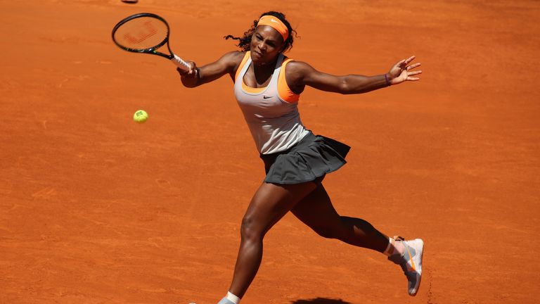 Serena Williams of the United States plays a forehand against Carla Suarez Navarro