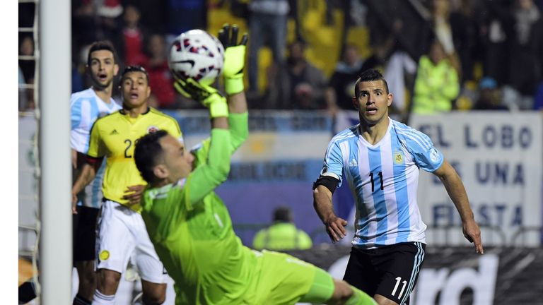 Colombia's David Ospina denied Lionel Messi as Sergio Aguero looked on