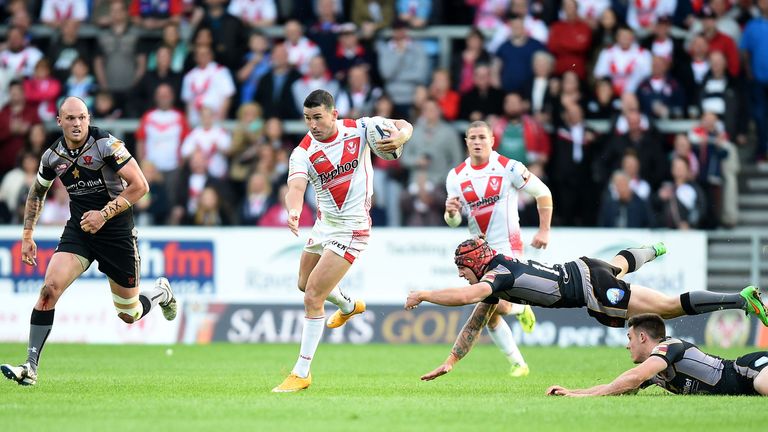 St Helens try-scorer Shannon McDonnell skips away from Theo Fages