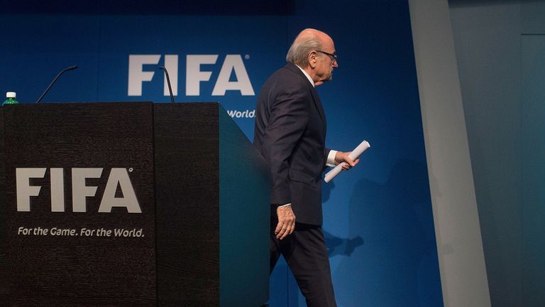 Sepp Blatter walks off the stage following the announcement