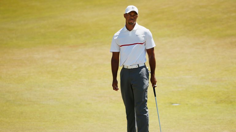 Tiger Woods continued to struggle on the greens on day two at Chambers Bay
