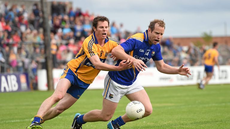 Longford's Brian Kavanagh in action against Kevin Harnett of Clare. 