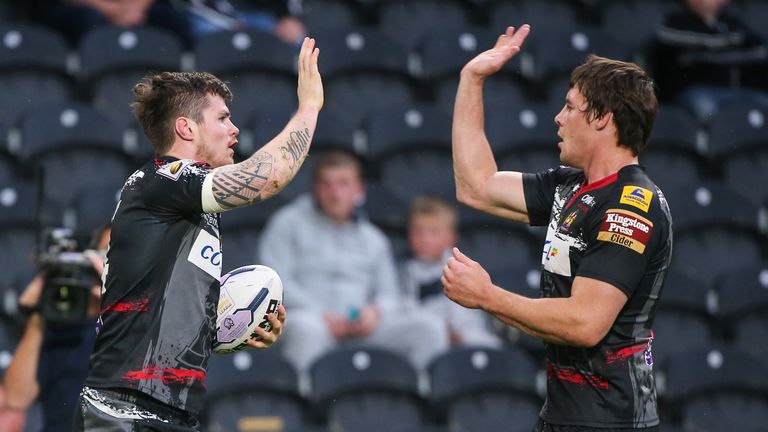 Wigan's John Bateman celebrates his try with Joel Tomkins